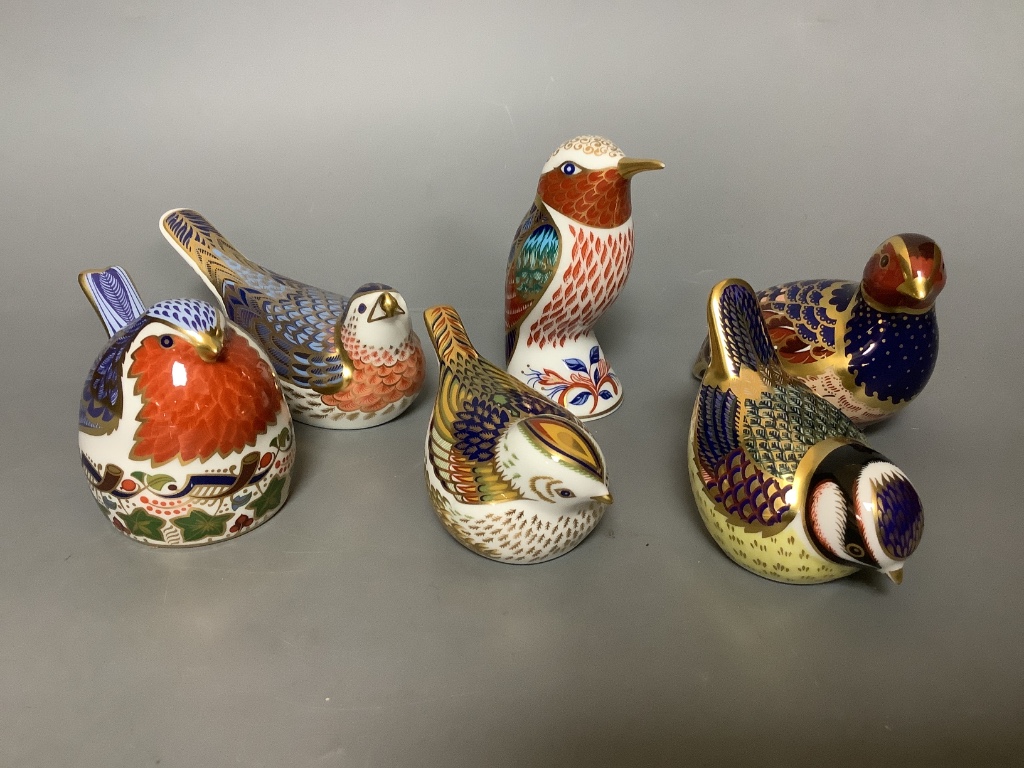 Six Royal Crown Derby bird paperweights, Robin Nesting, Quail (No. 4444/4500), Firecrest (Collectors Guild), Blue Tit, Kingfisher and Bluebird